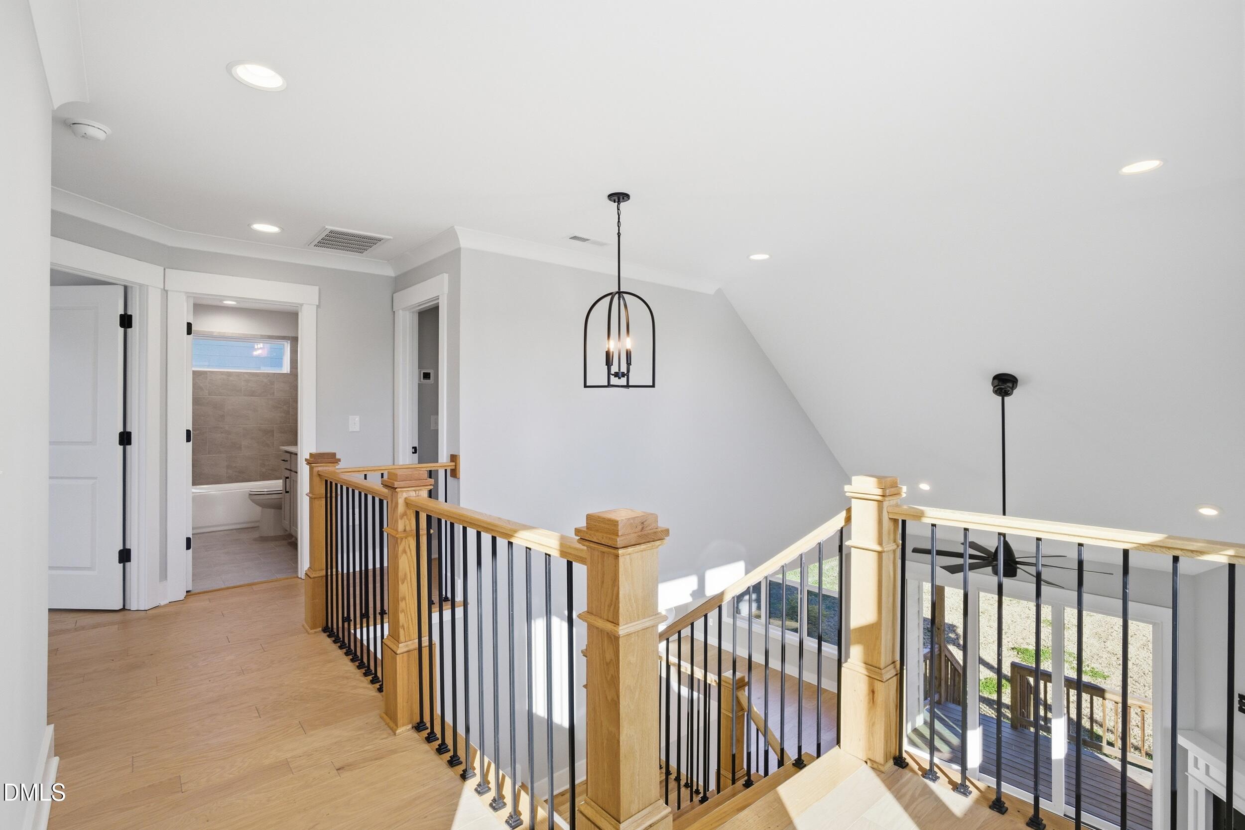 1439 Garner Road Raleigh, NC 27610 - Photo 30 of 37 a view of a hallway with windows
