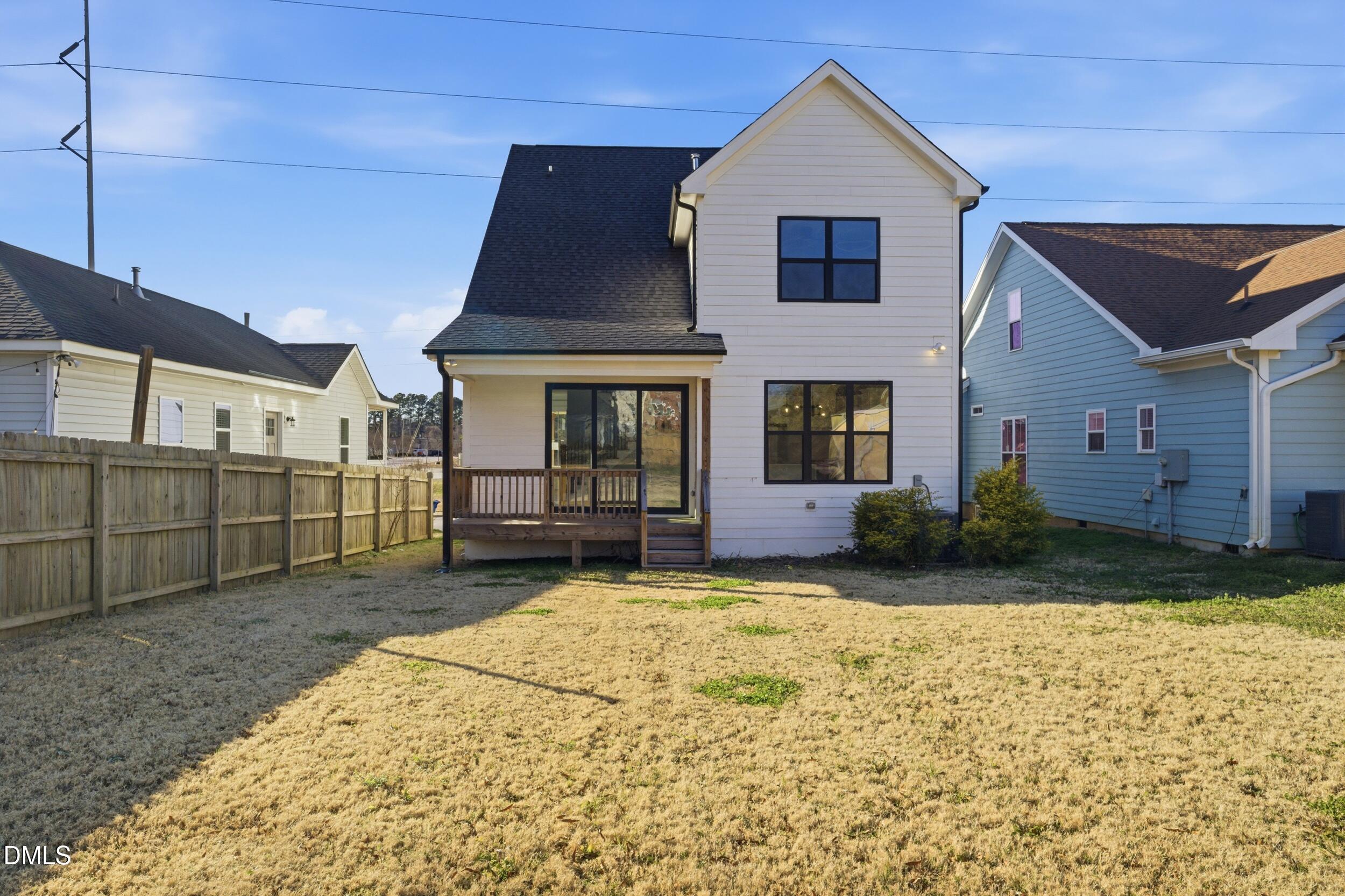 1439 Garner Road Raleigh, NC 27610 - Photo 33 of 37 a view of a house with a yard