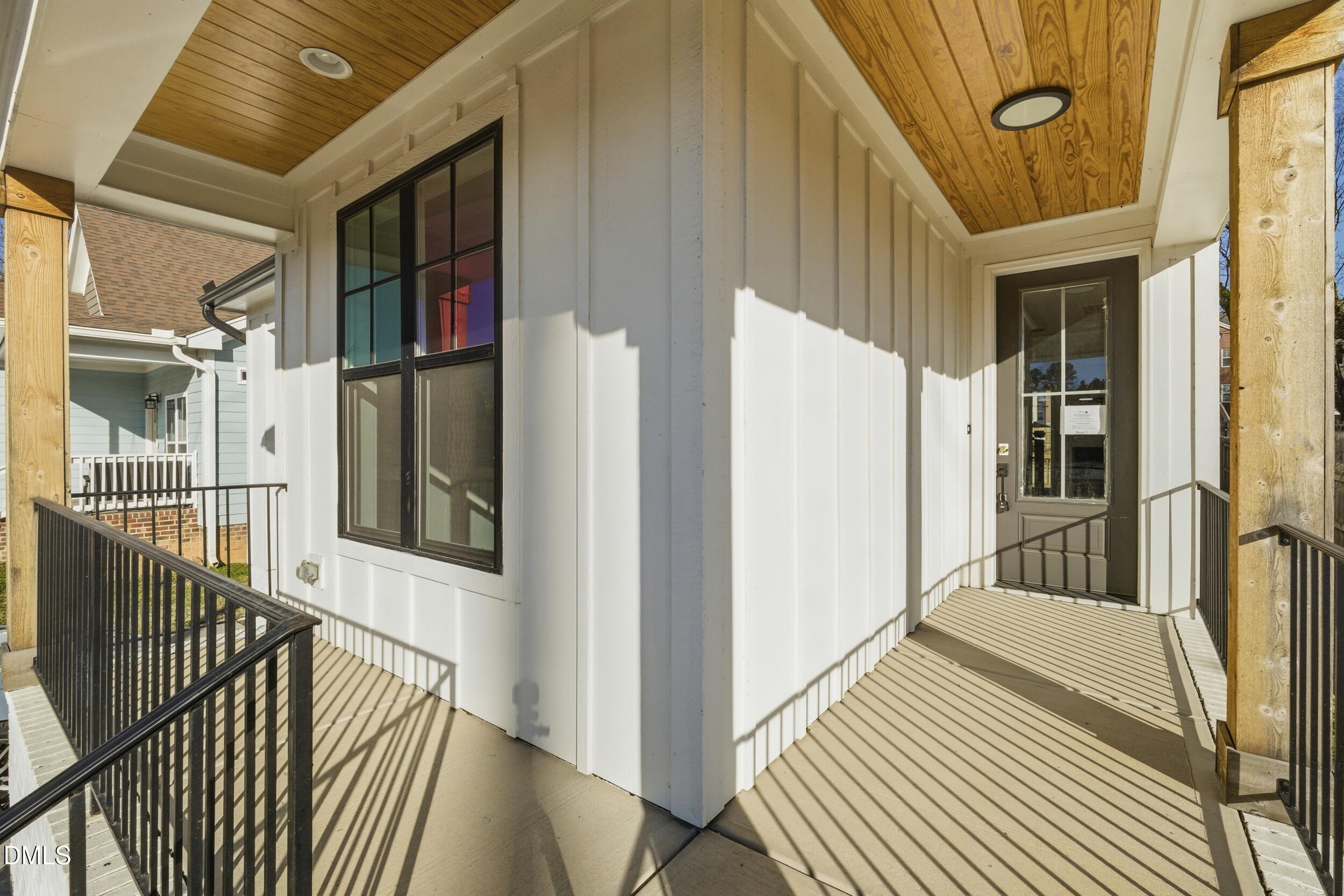 1439 Garner Road Raleigh, NC 27610 - Photo 34 of 37 a view of a balcony with wooden floor