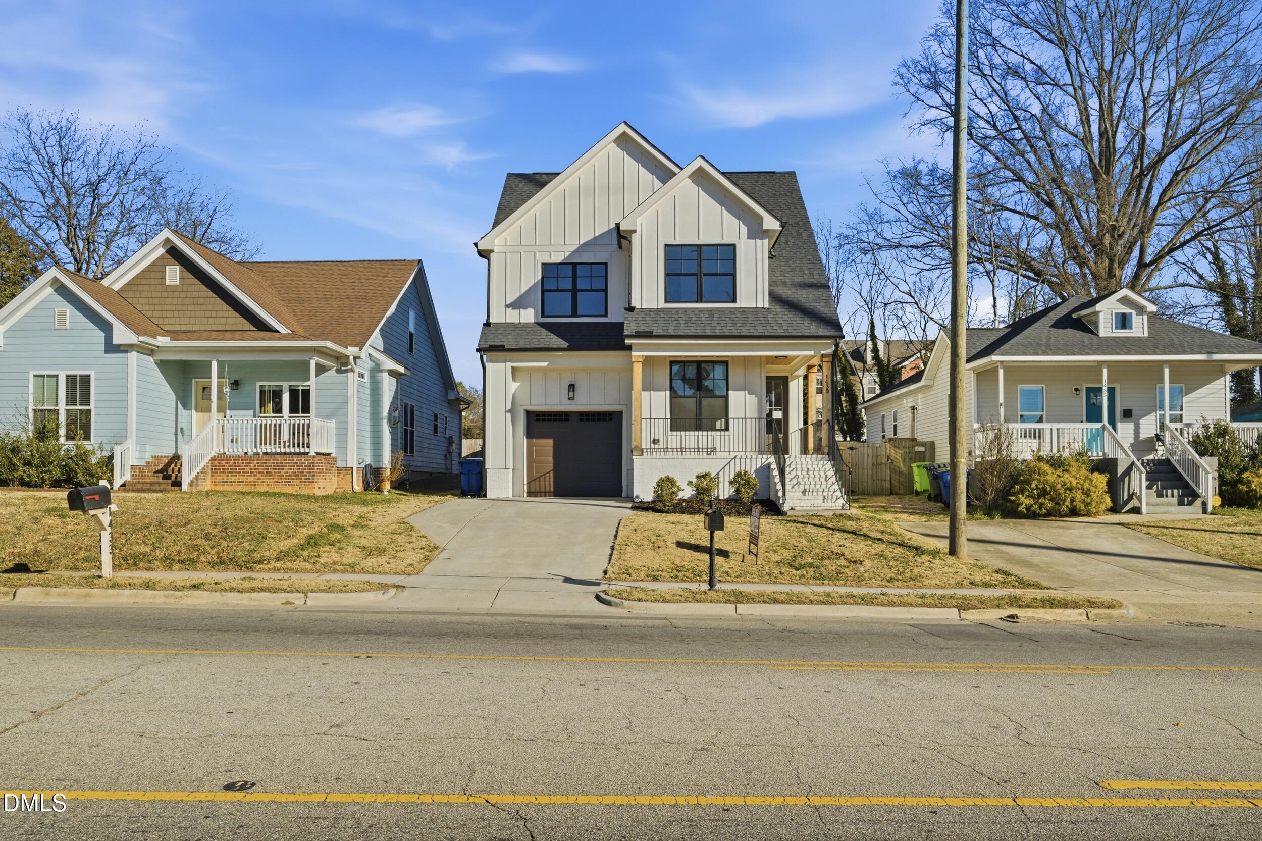 1439 Garner Road Raleigh, NC 27610 - Photo 35 of 37 a front view of a house with a yard