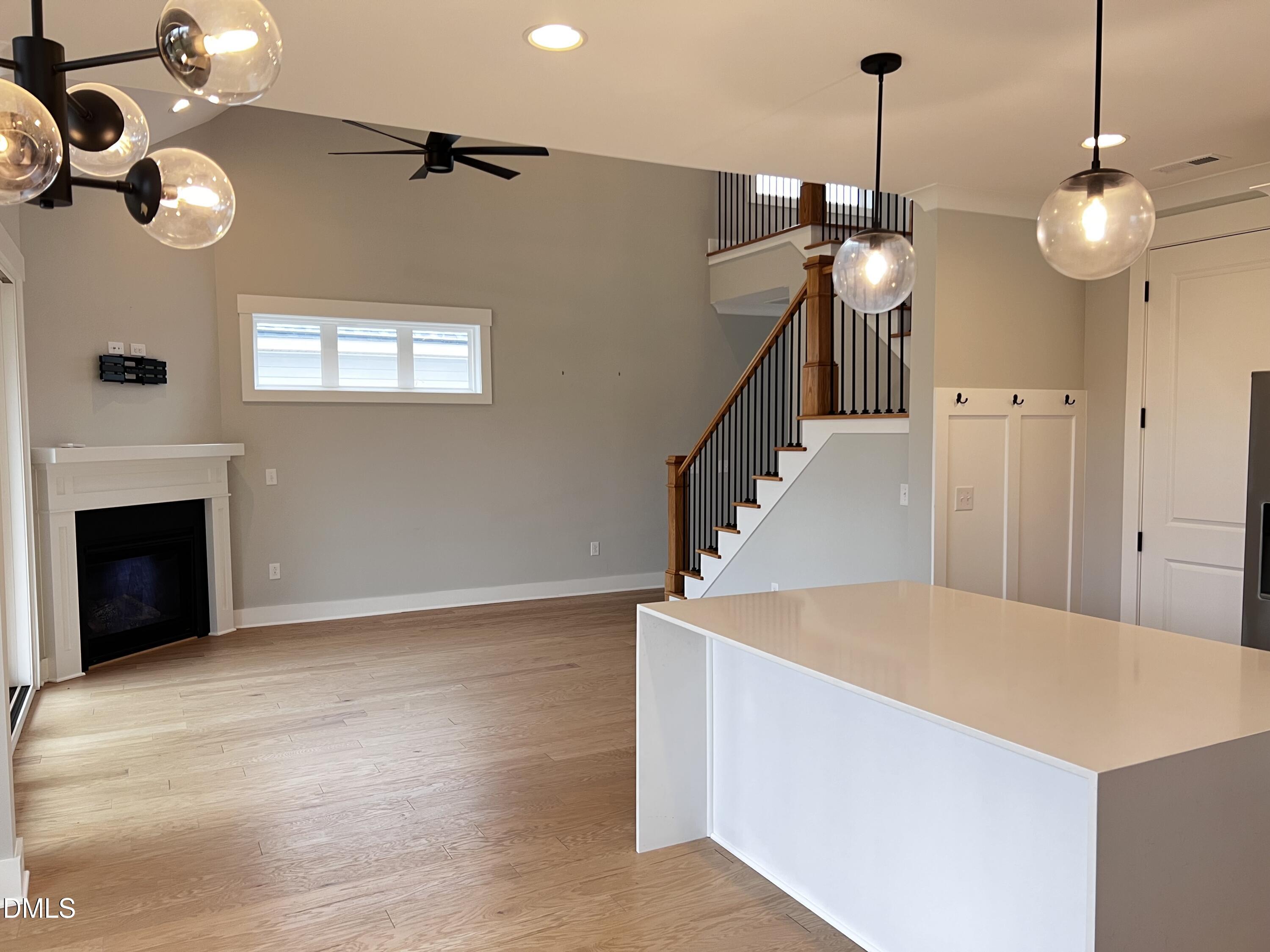 1439 Garner Road Raleigh, NC 27610 - Photo 8 of 28 a view of a livingroom with furniture and staircase