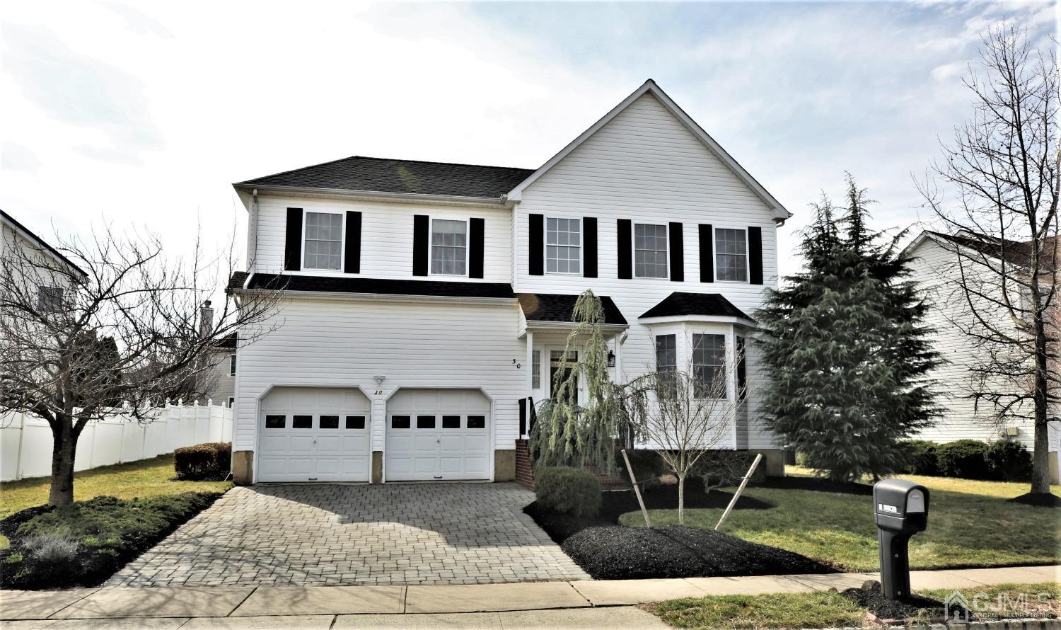 30 Potomac Road Monmouth Junction, NJ 08852 - Photo 1 of 60 a front view of a house with parking area