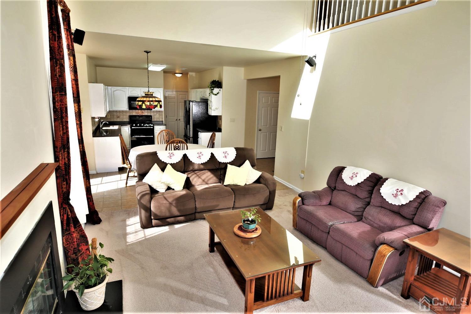 30 Potomac Road Monmouth Junction, NJ 08852 - Photo 24 of 60 a living room with furniture and wooden floor