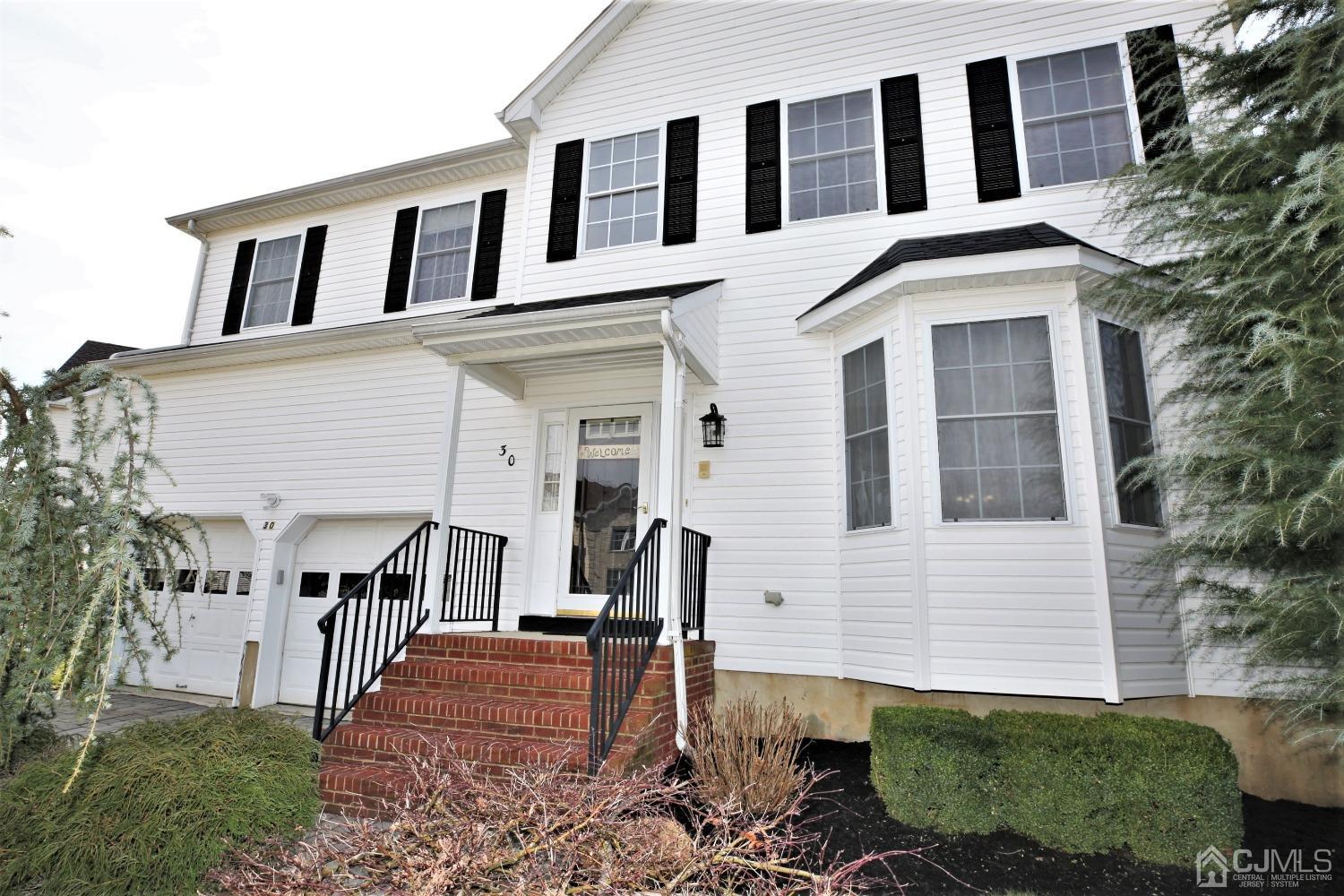 30 Potomac Road Monmouth Junction, NJ 08852 - Photo 3 of 60 a front view of a house with a yard