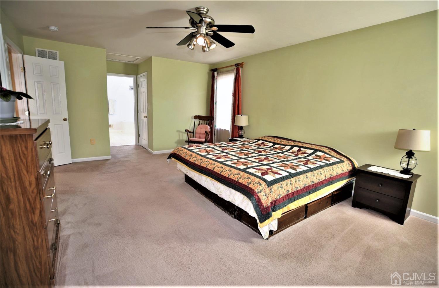 30 Potomac Road Monmouth Junction, NJ 08852 - Photo 34 of 60 a bedroom with a bed and window