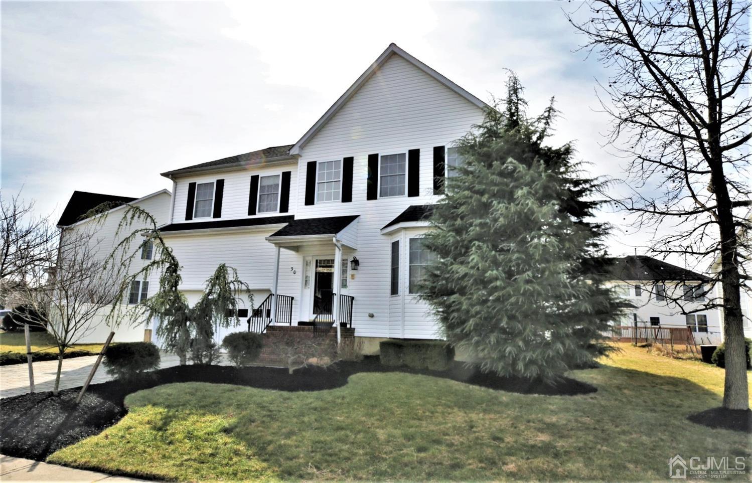 30 Potomac Road Monmouth Junction, NJ 08852 - Photo 60 of 60 a front view of a house with garden