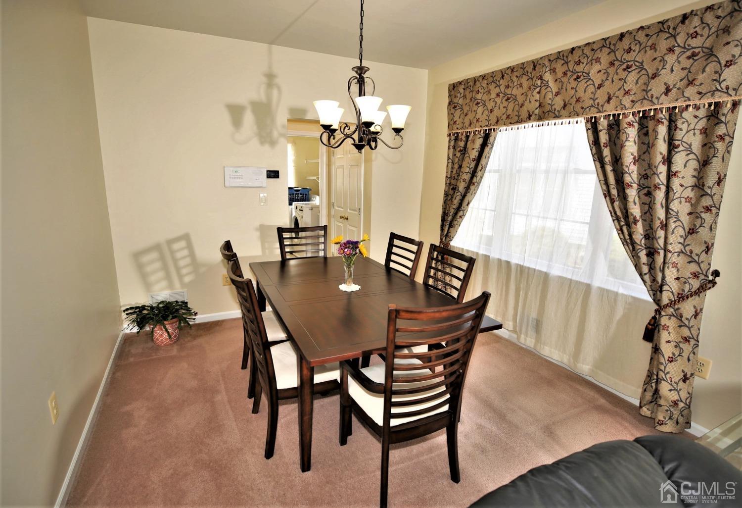 30 Potomac Road Monmouth Junction, NJ 08852 - Photo 10 of 60 a view of a dining room with furniture and wooden floor