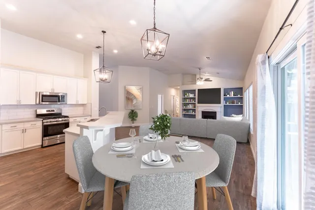 a view of a dining room with furniture