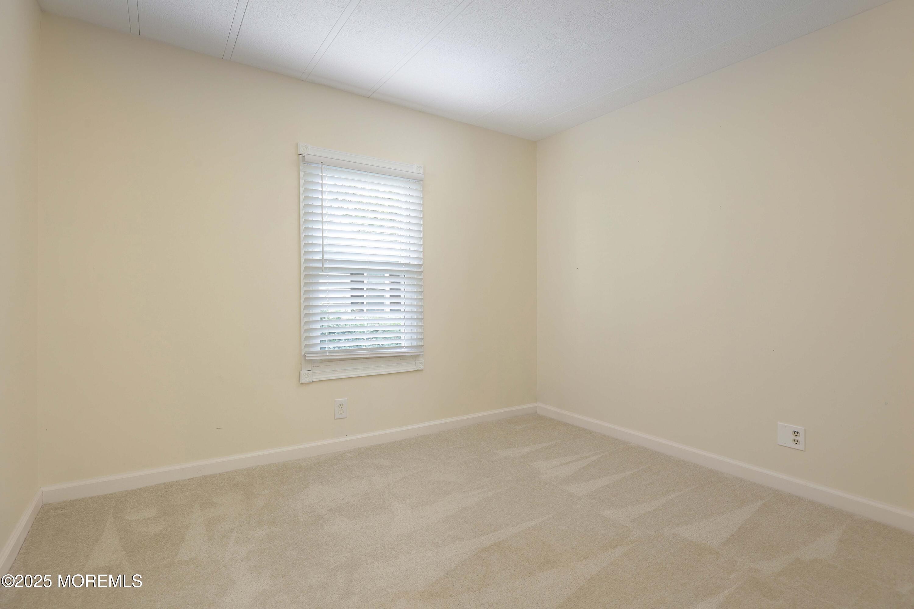 15 Cedar Court Manalapan, NJ 07726 - Photo 25 of 30 an empty room with a window