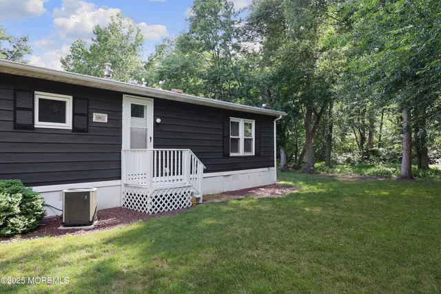 a view of a back yard of the house