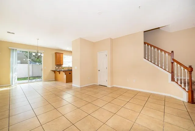 a view of an entryway with kitchen