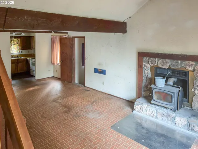 a view of a livingroom with a fireplace