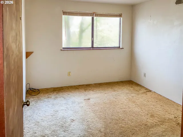 an empty room with a window