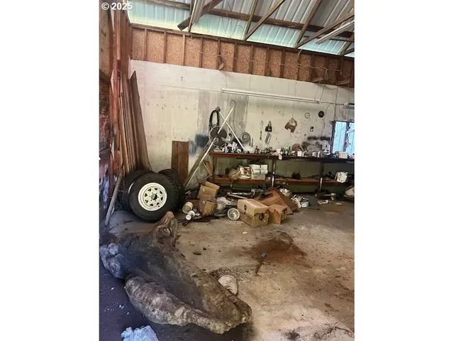 a view of a room with rack and chairs