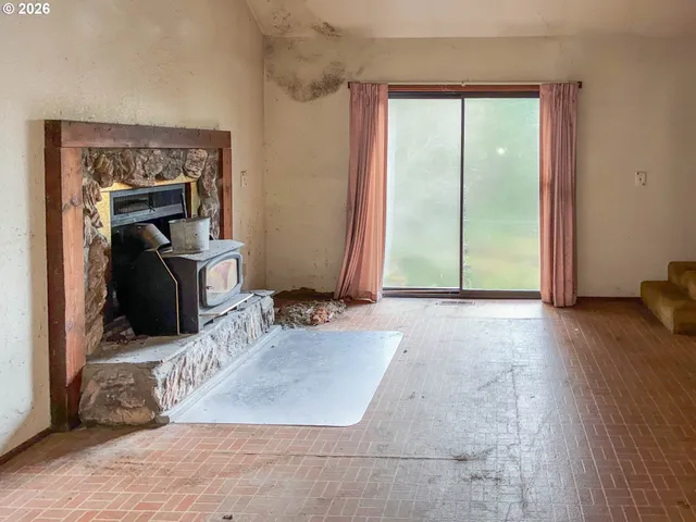 an entryway with a fireplace