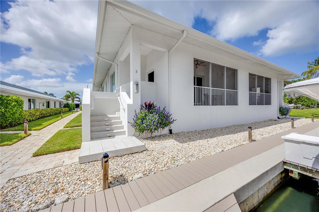 1395 Curlew Avenue, Unit 43 Naples, FL 34102 - Photo 24 of 24 a house view with a outdoor space