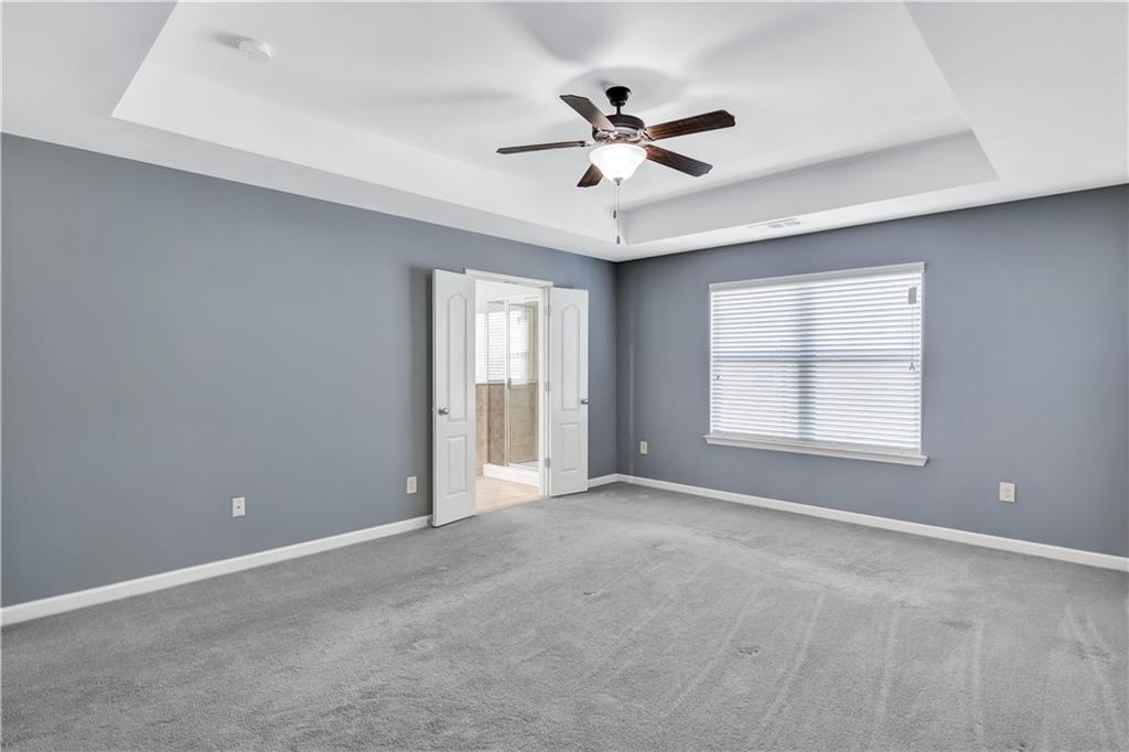 330 Avalon Square Fairburn, GA 30213 - Photo 23 of 52 a view of an empty room with a window