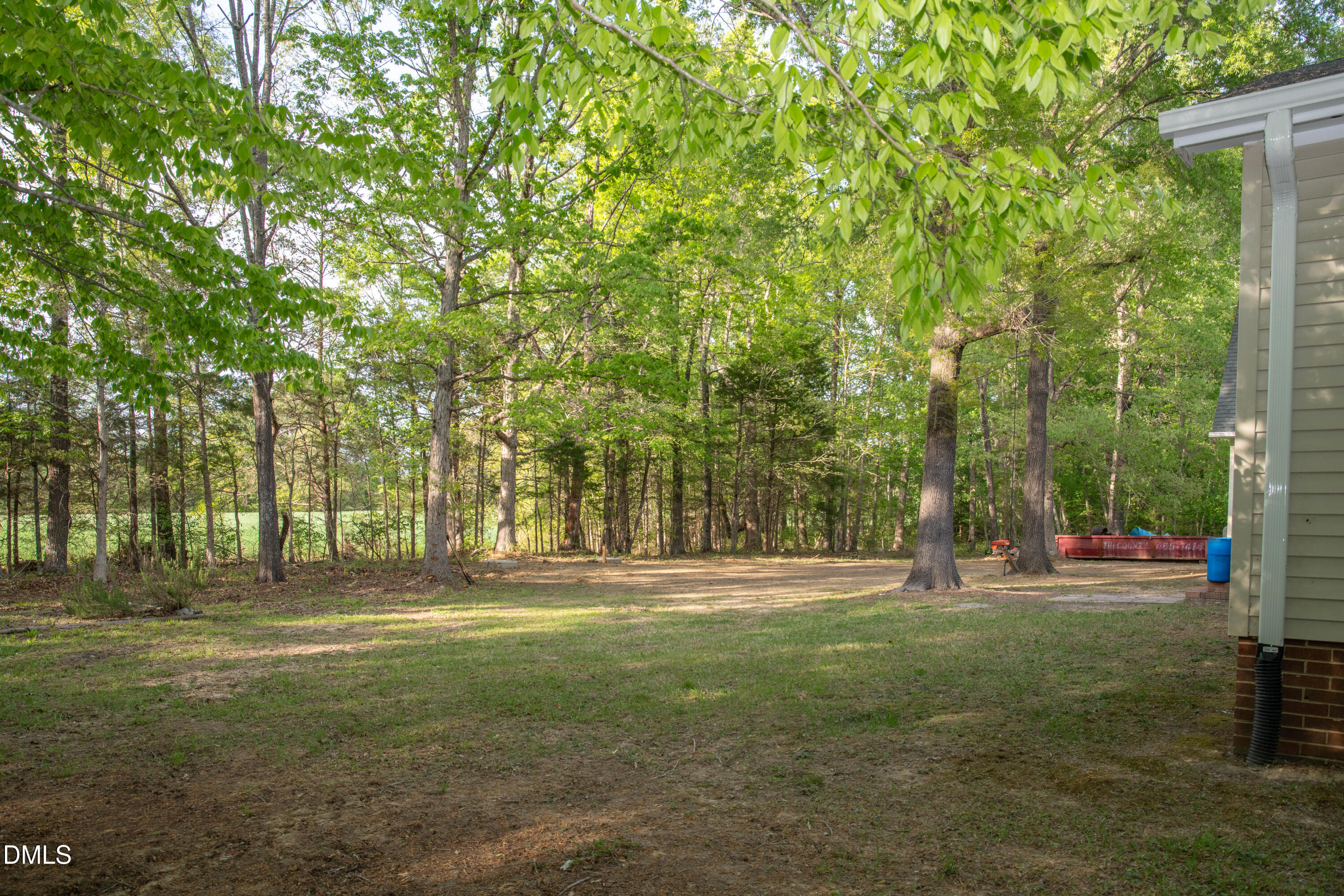 230 Hillsborough Road Timberlake, NC 27583 - Photo 6 of 15 a ground with lots of trees