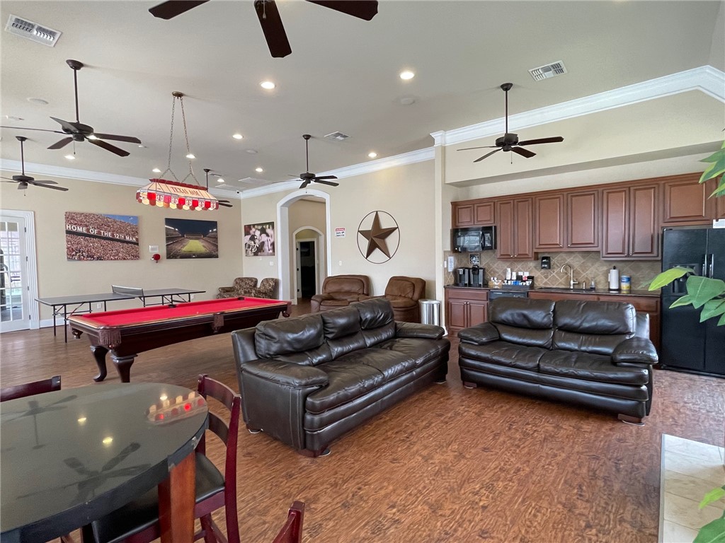 1198 Jones-Butler Road, Unit 2706 College Station, TX 77840 - Photo 15 of 17 a living room with lots of furniture and kitchen view