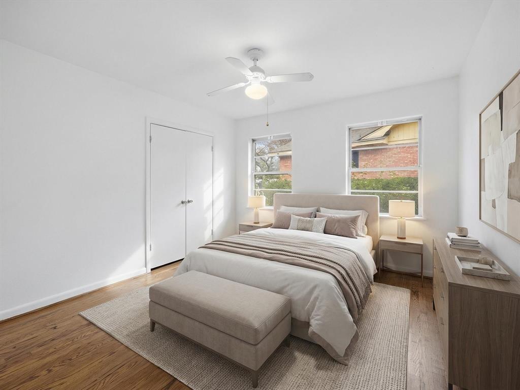 514 West Ridgewood Drive Garland, TX 75041 - Photo 12 of 39 Bedroom featuring wood finished floors and a ceiling fan