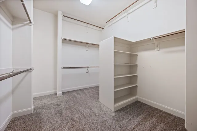 a view of an empty walk in closet