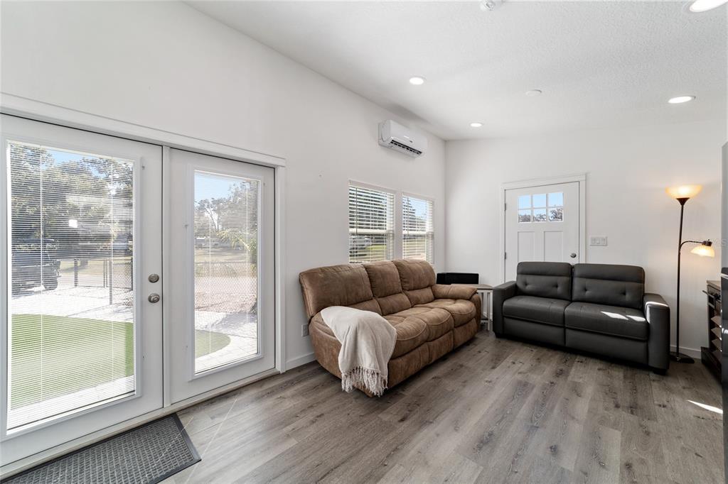 15991 Northeast 243rd Place Road, Unit 351 & 352 Fort McCoy, FL 32134 - Photo 16 of 86 a living room with furniture and a large window