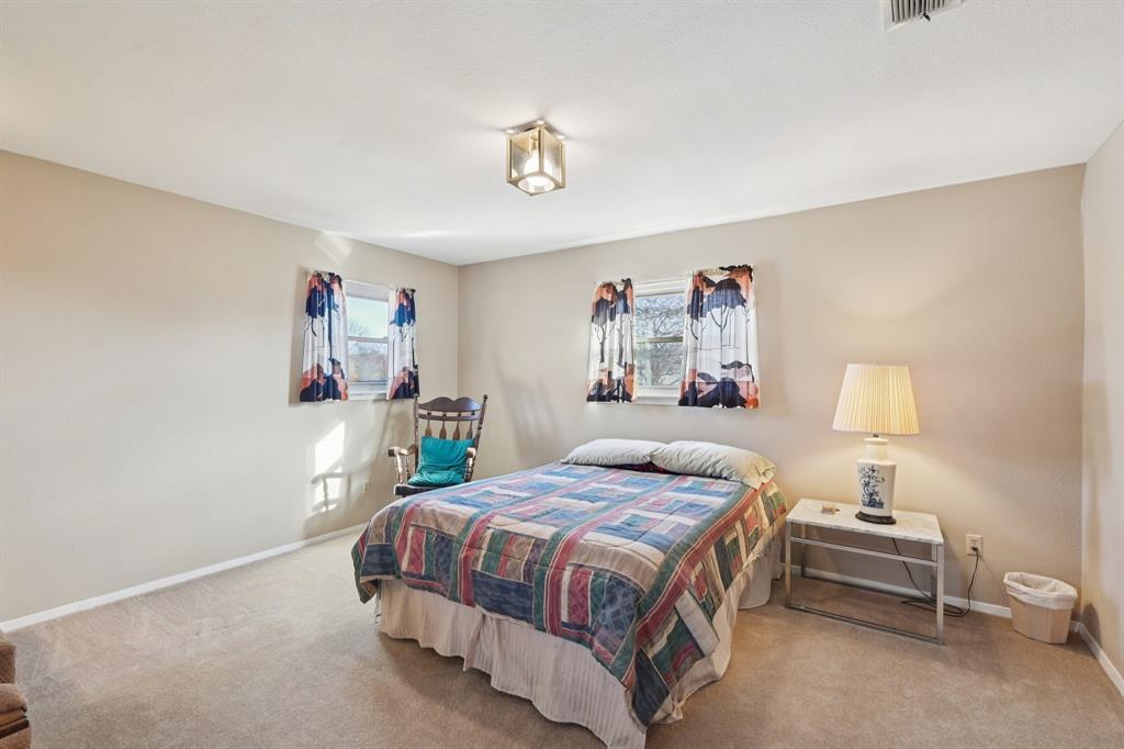 840 Ridge Drive Bedford, TX 76021 - Photo 15 of 40 The game room upstairs is large enough for this bed as well as a sitting area.
