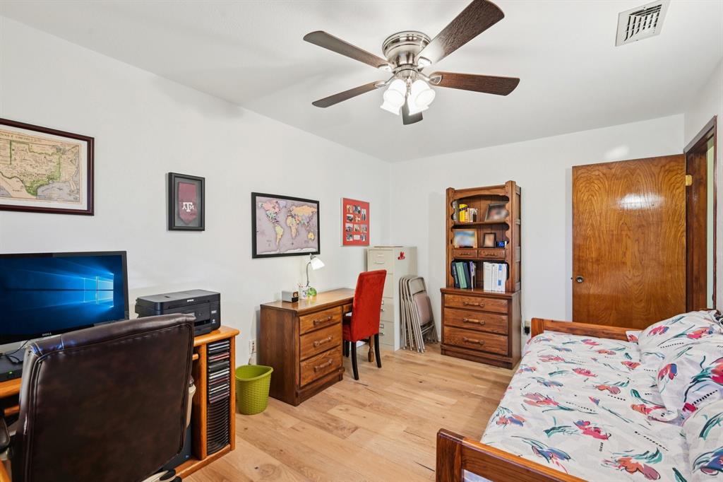 840 Ridge Drive Bedford, TX 76021 - Photo 30 of 40 One of the bedrooms on the main floor.