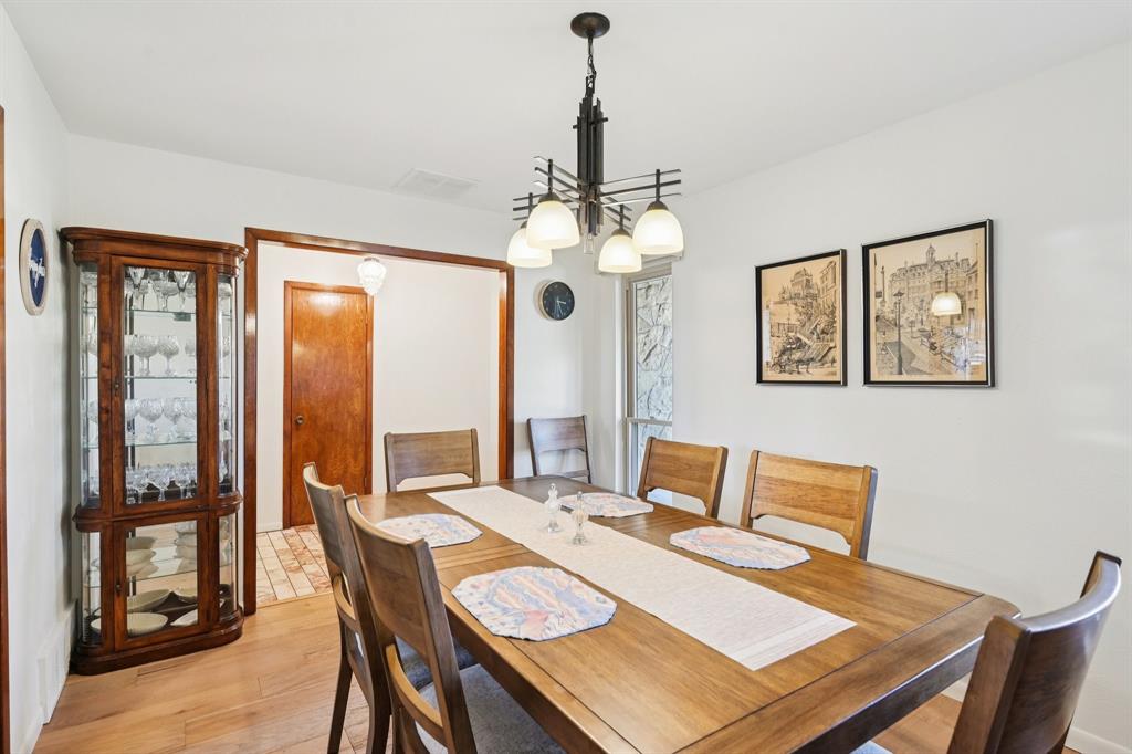 840 Ridge Drive Bedford, TX 76021 - Photo 8 of 40 Another view of the dining room looking towards the entry.