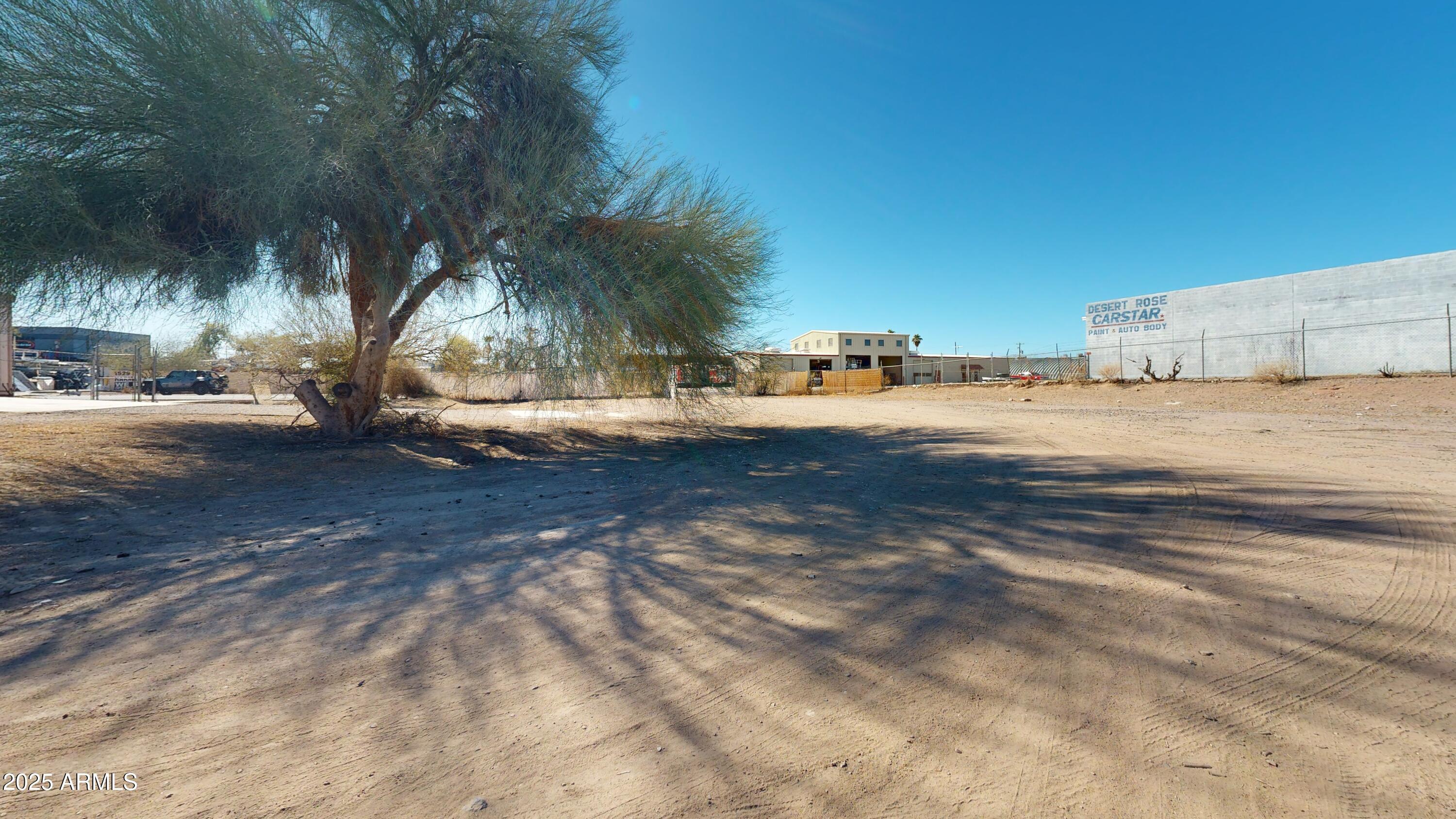 1474 East 18th Avenue, Unit 33 Apache Junction, AZ 85119 - Photo 5 of 5 a view of back yard of the house