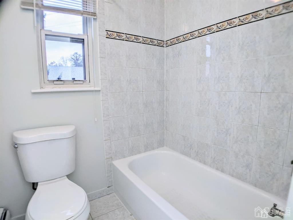 B Alva Court Edison, NJ 08817 - Photo 13 of 17 a bathroom with a toilet and a shower