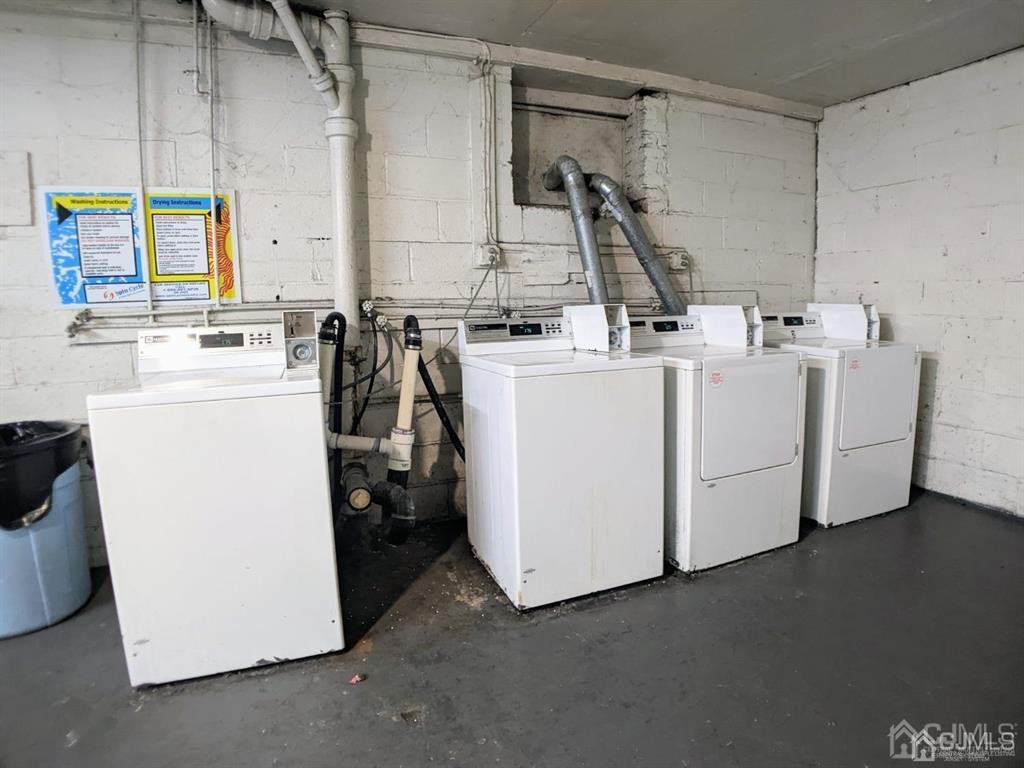 B Alva Court Edison, NJ 08817 - Photo 16 of 17 a view of storage and utility room with washer and dryer