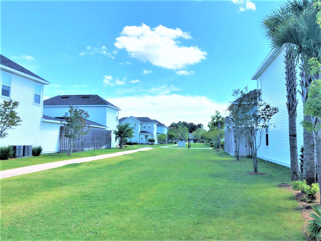 148 Chapman Street Santa Rosa Beach, FL 32459 - Photo 18 of 23 a view of a big yard with a house