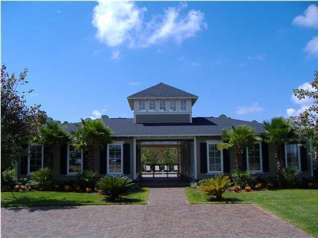148 Chapman Street Santa Rosa Beach, FL 32459 - Photo 19 of 23 a front view of a house with garden
