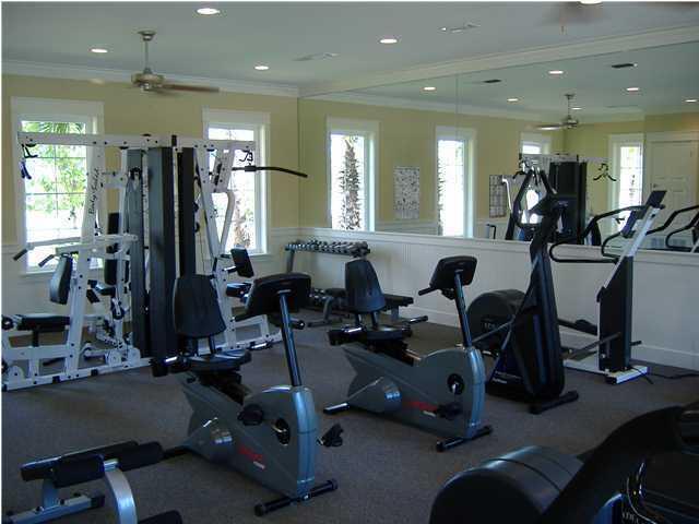 148 Chapman Street Santa Rosa Beach, FL 32459 - Photo 21 of 23 a gym room with lots of gym equipment