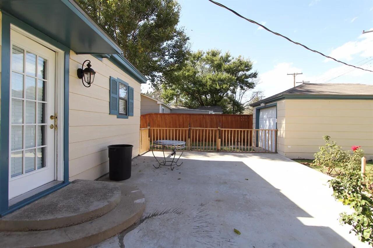 2610 35th Street Lubbock, TX 79410 - Photo 16 of 19 a backyard of house with seating space
