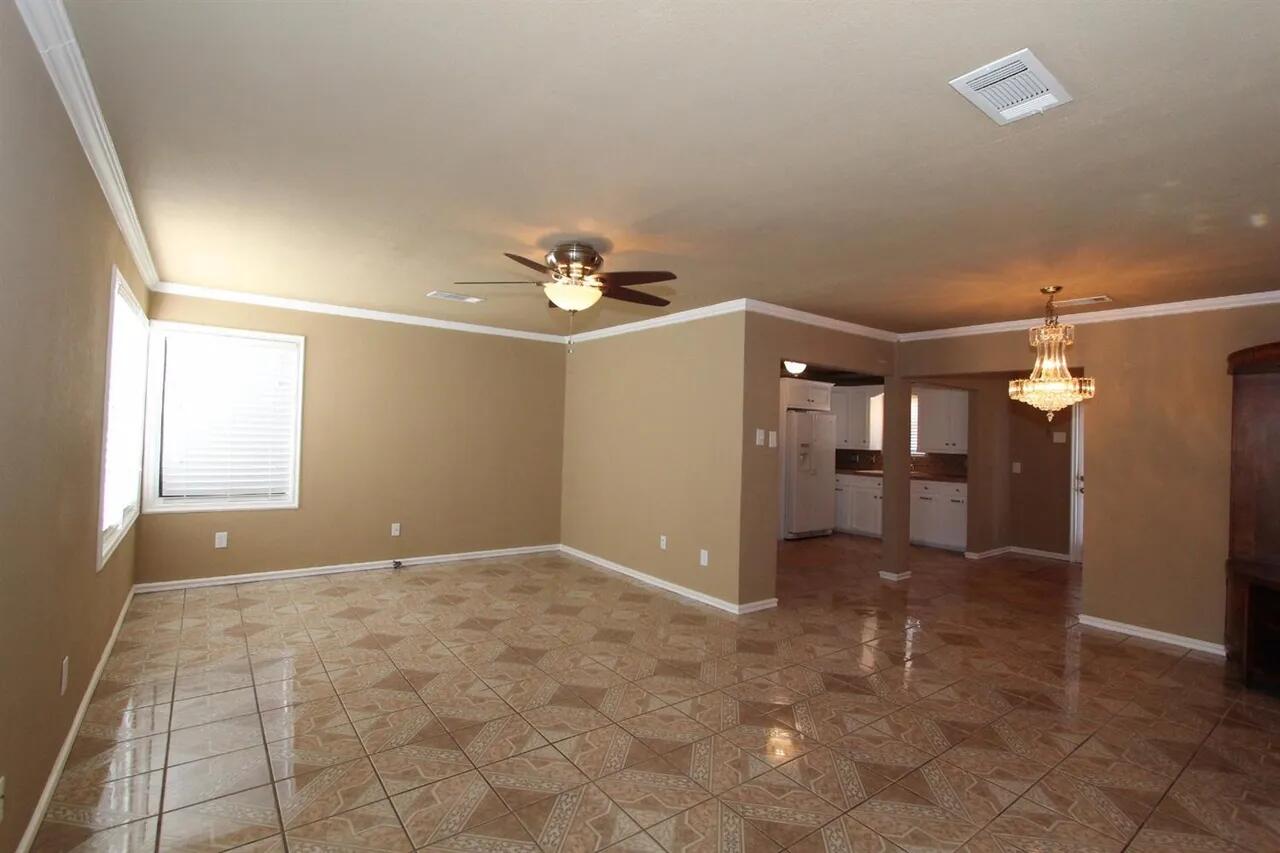2610 35th Street Lubbock, TX 79410 - Photo 2 of 19 a view of a livingroom with a kitchen
