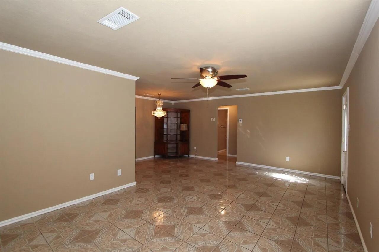 2610 35th Street Lubbock, TX 79410 - Photo 4 of 19 wooden floor in an empty room