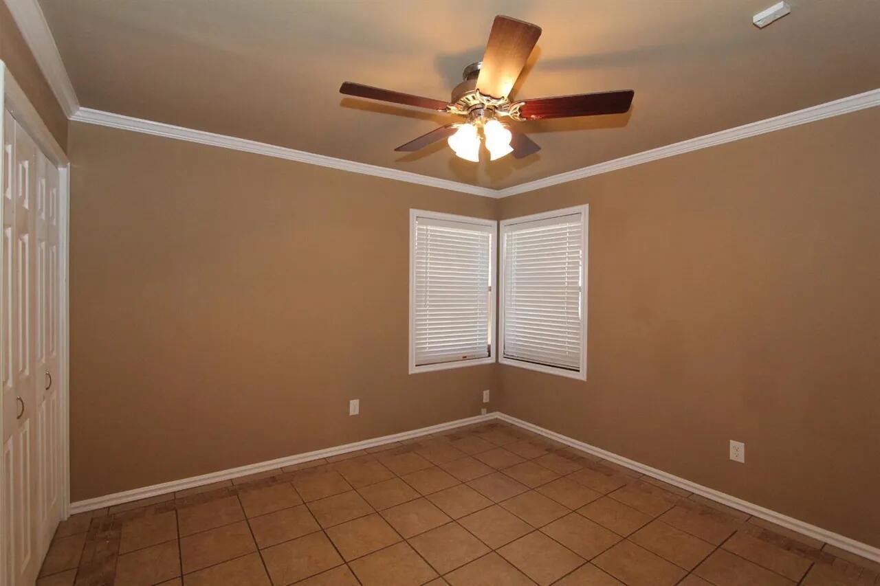 2610 35th Street Lubbock, TX 79410 - Photo 9 of 19 a view of an empty room and window