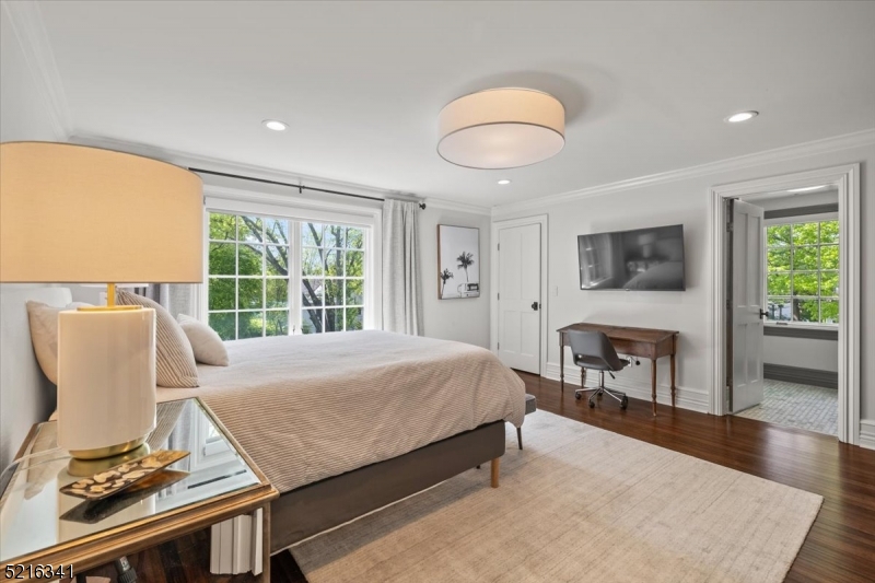 350 South Street, Unit 2 Morristown, NJ 07960 - Photo 26 of 36 a living room with furniture and a table