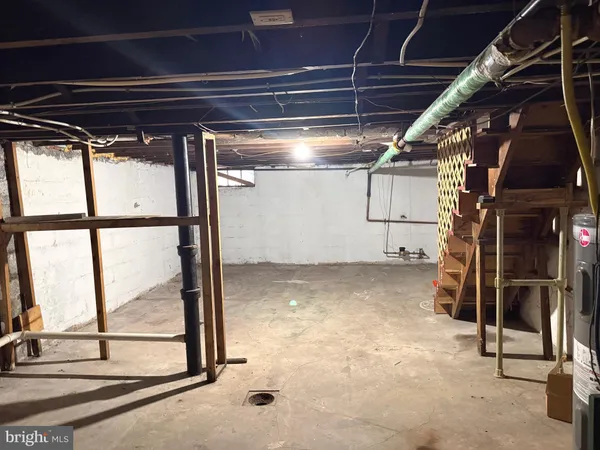 a view of a room with wooden walls