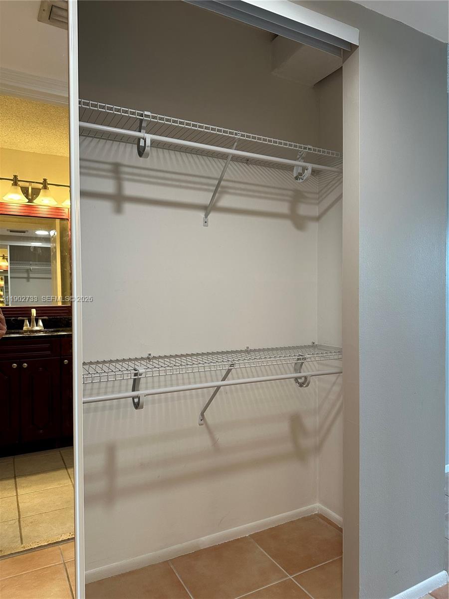 3650 Inverrary Drive, Unit 3YG Lauderhill, FL 33319 - Photo 17 of 30 a view of a walk in closet