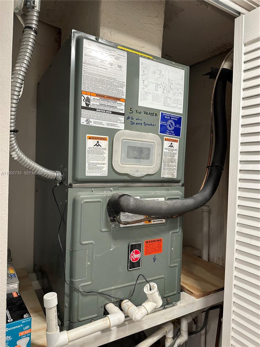 3650 Inverrary Drive, Unit 3YG Lauderhill, FL 33319 - Photo 25 of 30 a bathroom with a toilet and a sink