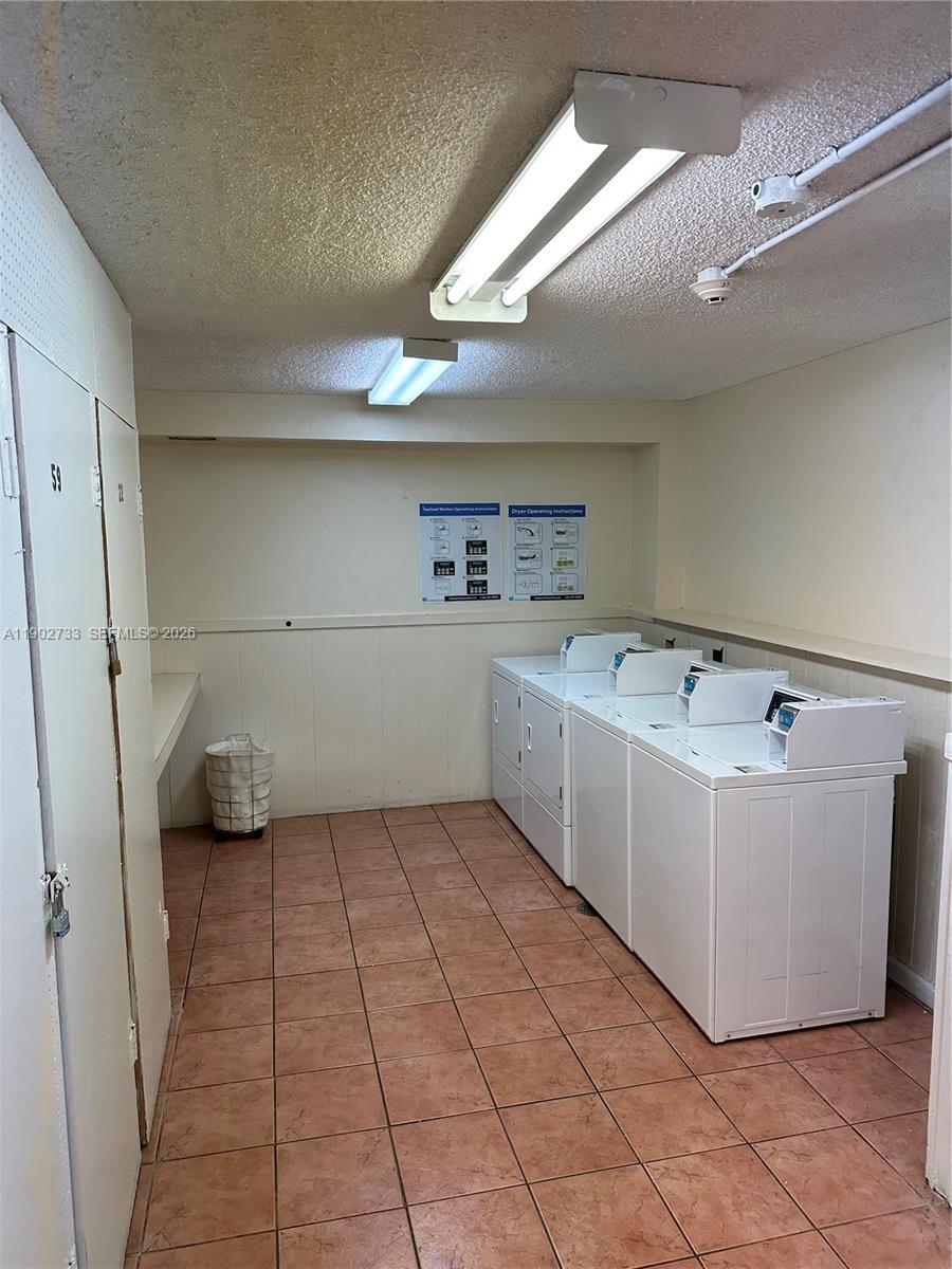 3650 Inverrary Drive, Unit 3YG Lauderhill, FL 33319 - Photo 27 of 30 a bathroom with a bathtub and a shower