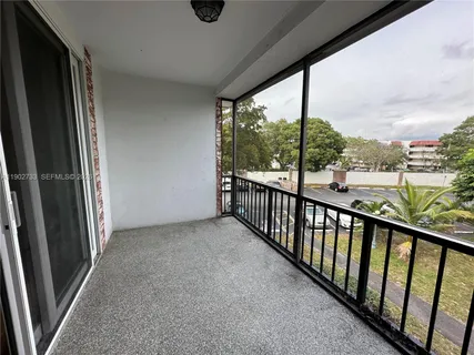 a kitchen with stainless steel appliances granite countertop a refrigerator stove and microwave