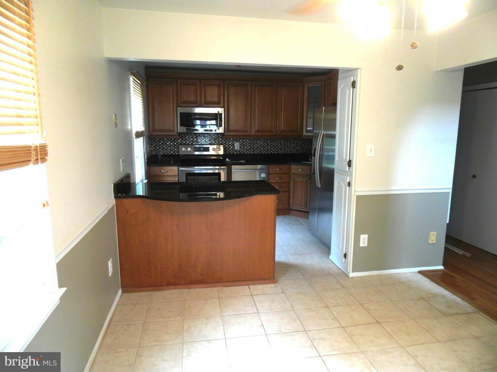 7765 Euclid Way Springfield, VA 22153 - Photo 9 of 30 Dining Room to Kitchen
