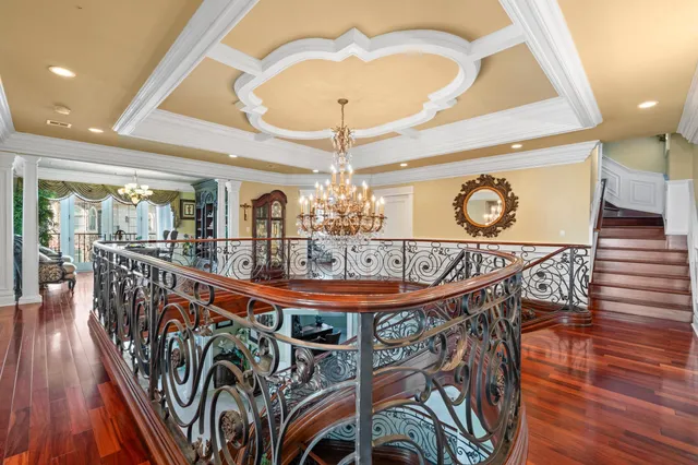 a dining room with furniture and wooden floor