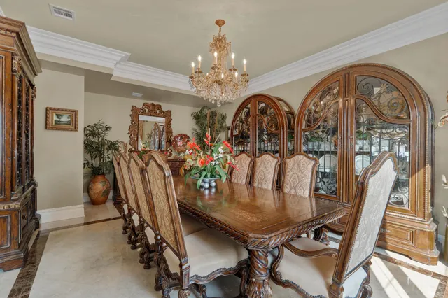 a front view of a residential apartment building with a yard