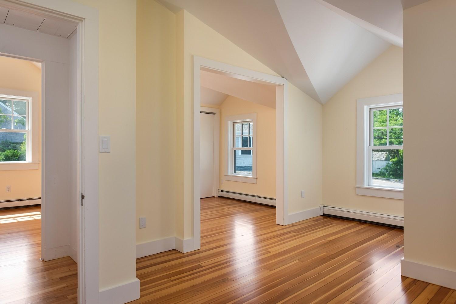 773 South Main Street Centerville, MA 02632 - Photo 11 of 33 a view of an empty room with wooden floor and a window