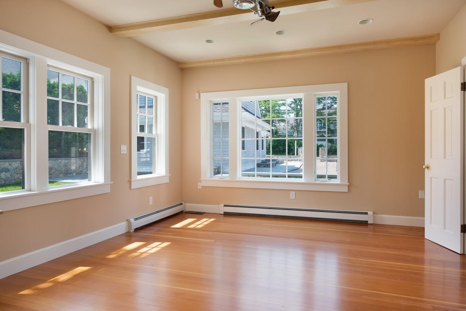 773 South Main Street Centerville, MA 02632 - Photo 15 of 33 a view of an empty room with a window and wooden floor